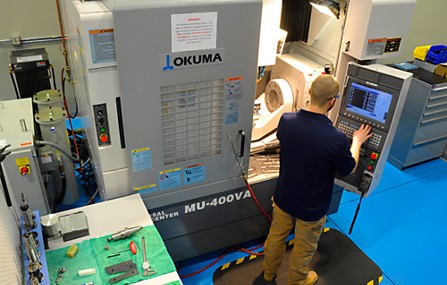 okuma machine and worker
